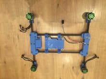 Frame with motors, one ESC and the Raspberry Pi mount with vibration dampers